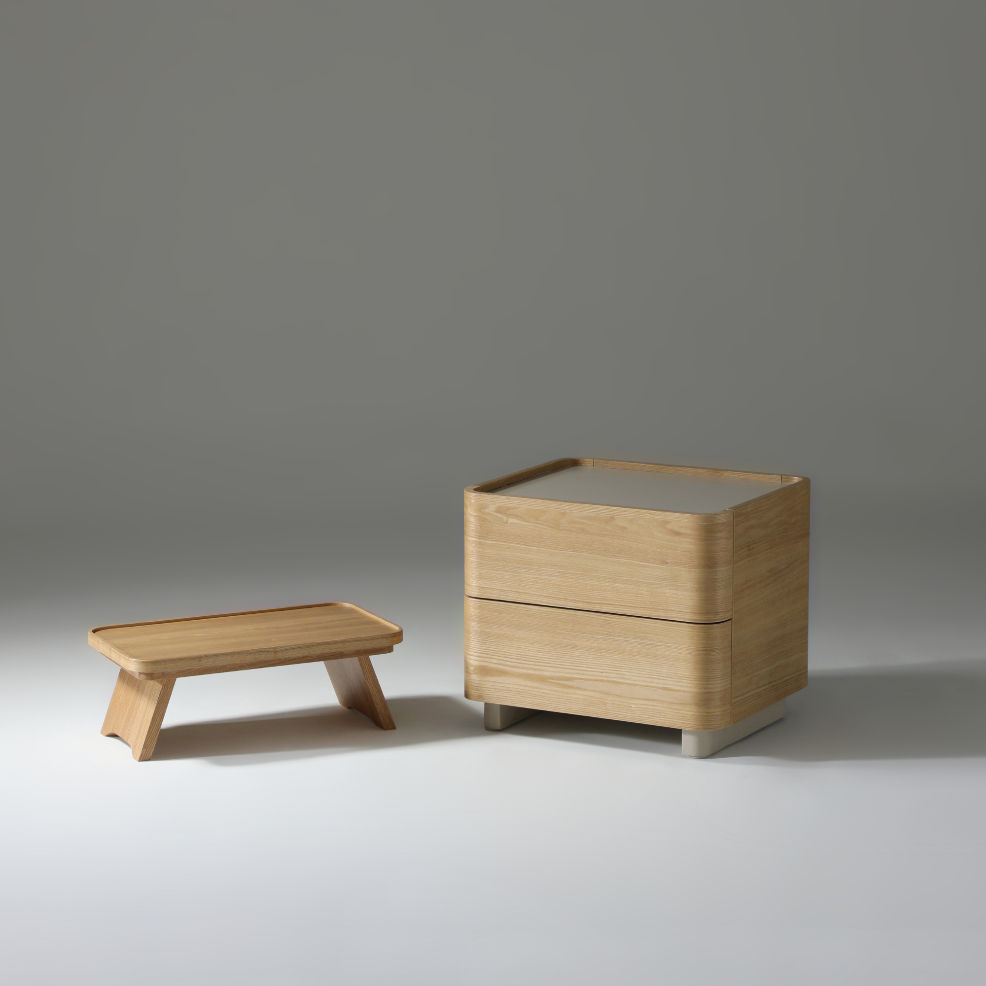 Xara 2 drawer bedside table in natural ash with a stylish design, perfect for bedroom organization.