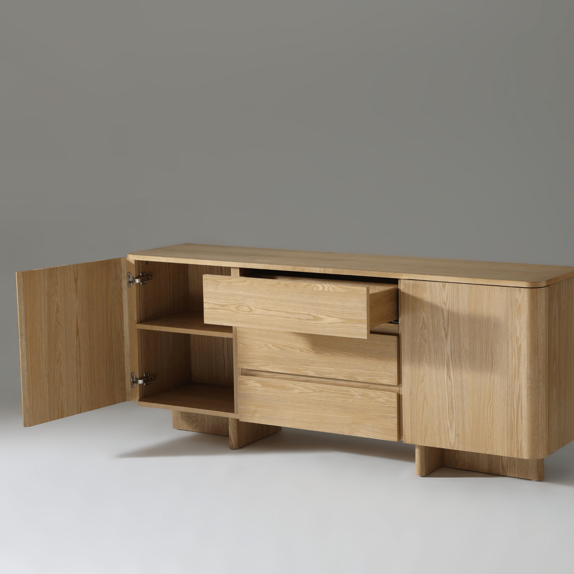 Kiama 1.8m Natural Ash Buffet Sideboard with open door and drawers, showcasing its modern design and natural finish.