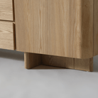 Close-up of the natural ash finish and organic edges of the Kiama 2 Door Entertainment Lowline cabinet.