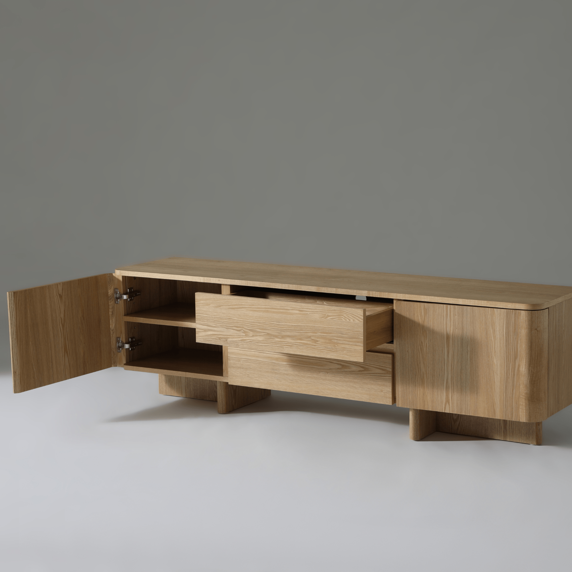 Kiama 1.8m 2 Door Natural Ash TV cabinet with drawers and open storage, showcasing modern coastal design.