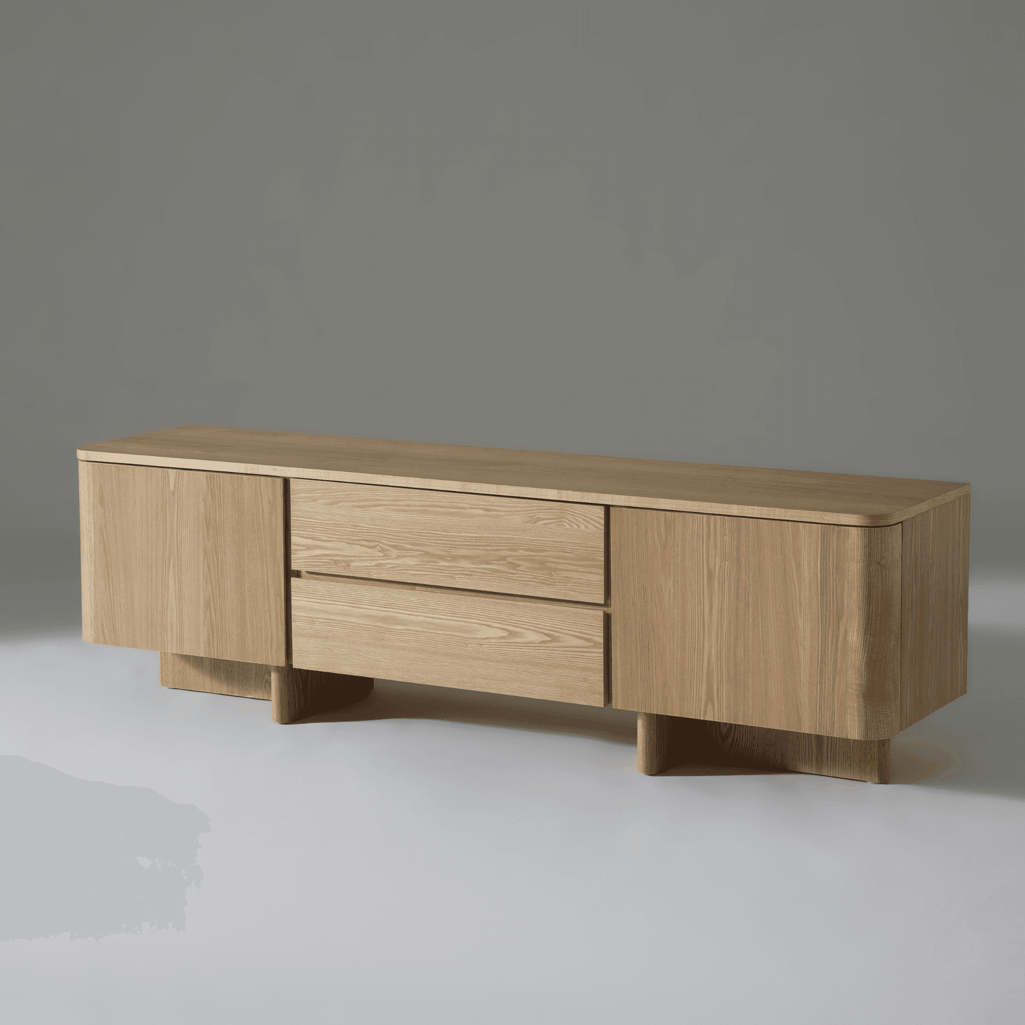 Kiama 1.8m 2 Door Entertainment Lowline in natural ash wood, showcasing a coastal-modern design with ample storage.