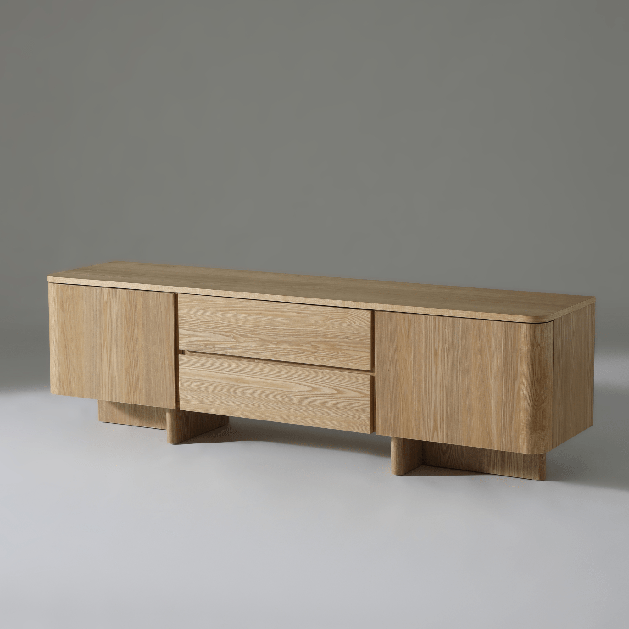 Kiama 1.8m 2 Door Entertainment Lowline in natural ash wood, showcasing a coastal-modern design with ample storage.