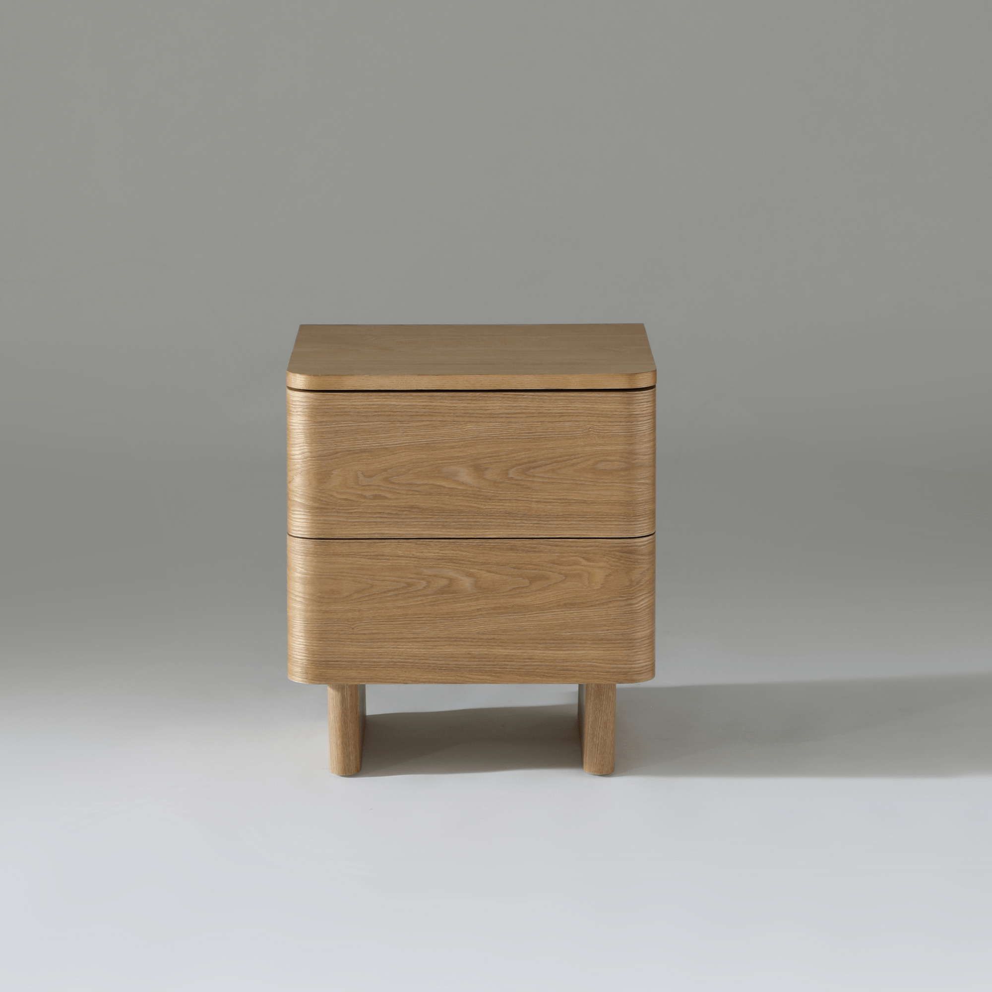 Kiama 2 Drawer bedside table in natural ash wood with smooth finish, ideal for practical bedroom storage.