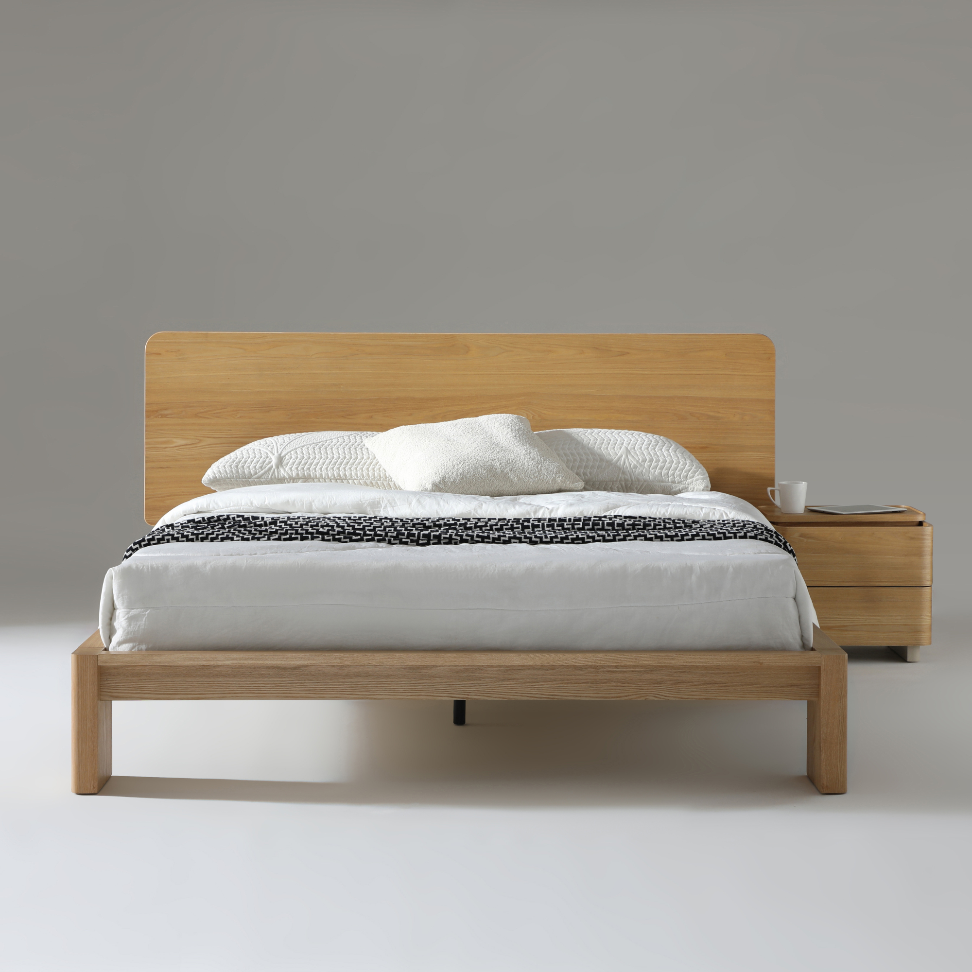 Xara Natural Ash Queen Size Bed featuring modern coastal design with durable construction and stylish bedding.