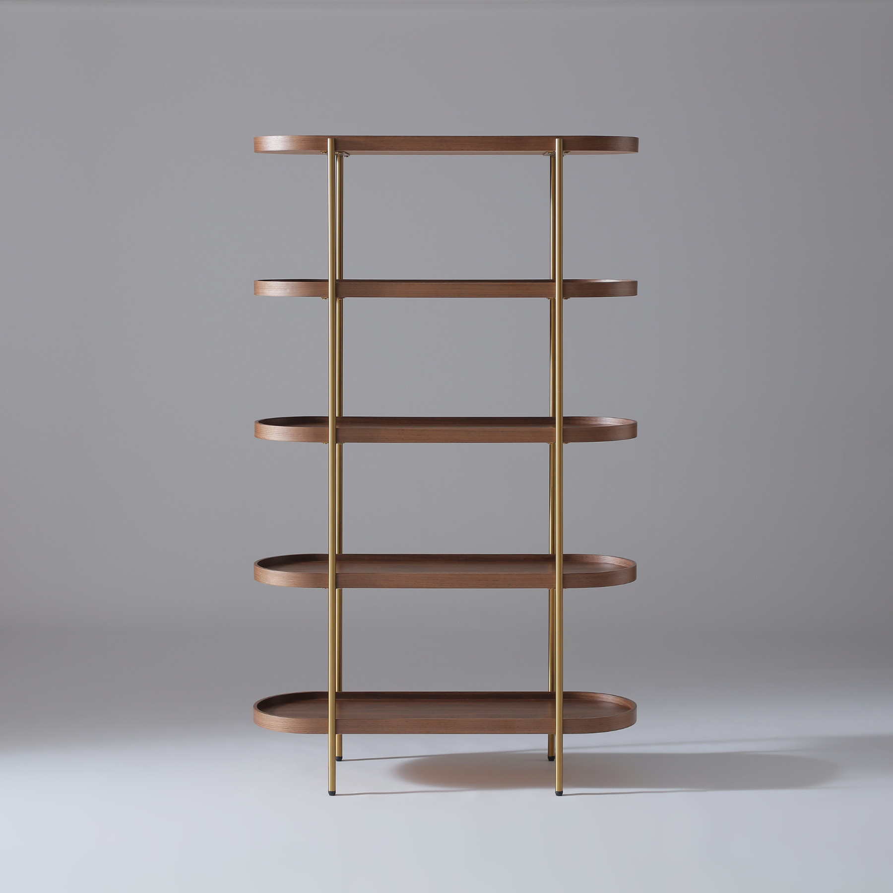 Cleo modern bookcase with five Walnut veneer shelves and stylish gold metal frame.