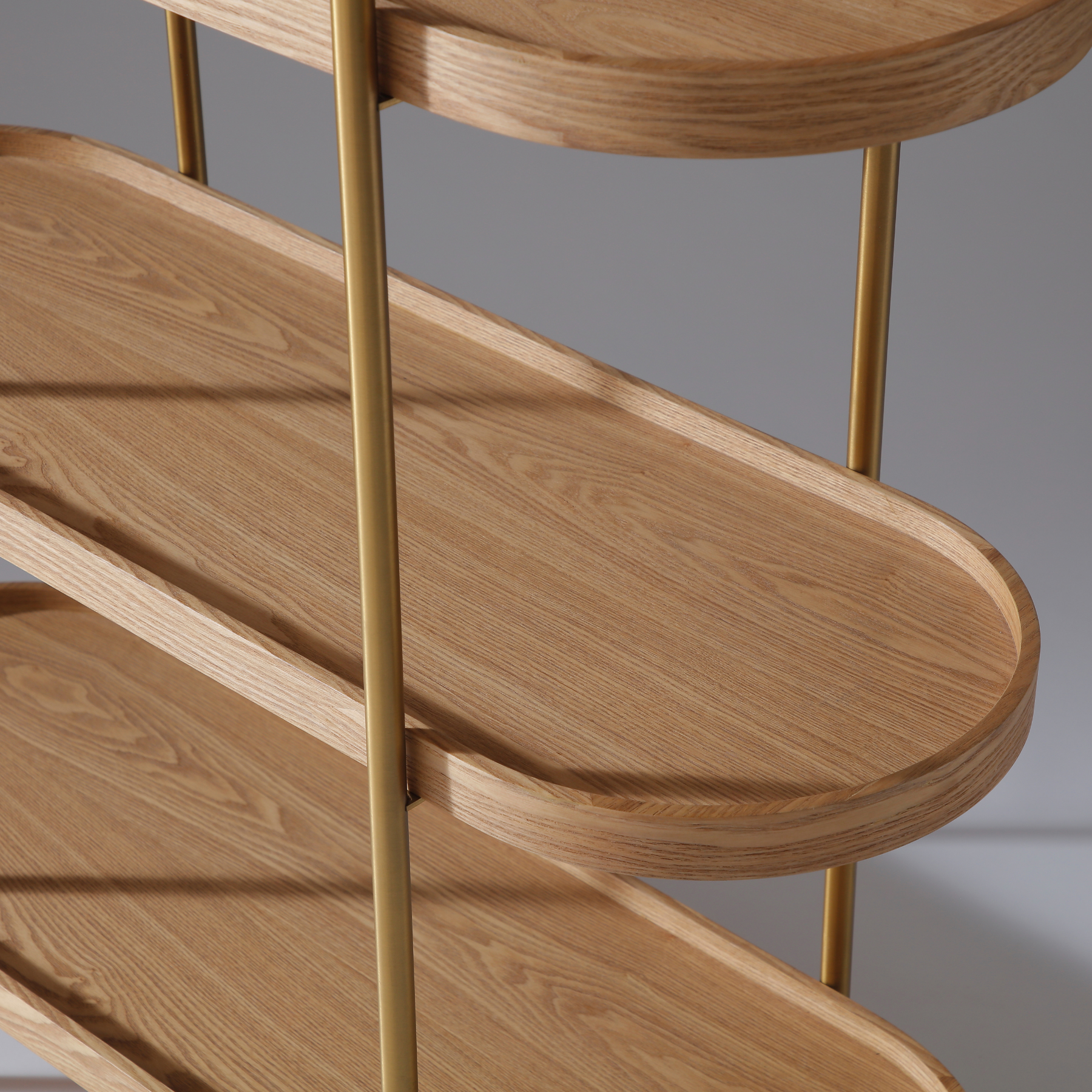 Cleo open shelving unit with five Natural Ash shelves and elegant gold metal frame.