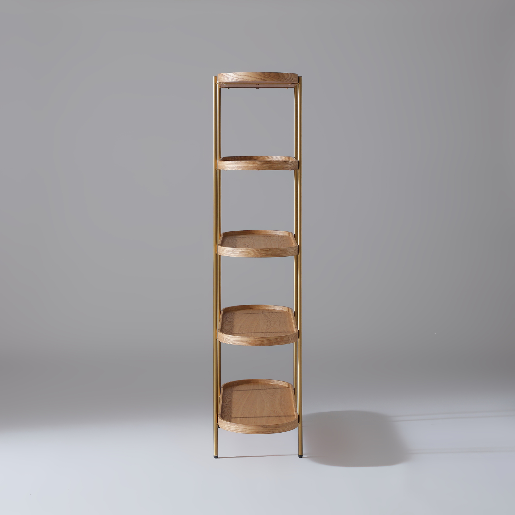 Contemporary bookcase with Natural Ash veneer shelves and a slender gold powder-coated frame.