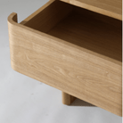 Minimalist bedside table with two soft-close drawers in Warm Grey and Natural Ash finish.

