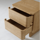 Modern Xara bedside unit with spacious soft-close drawers and refined timber grain finish.