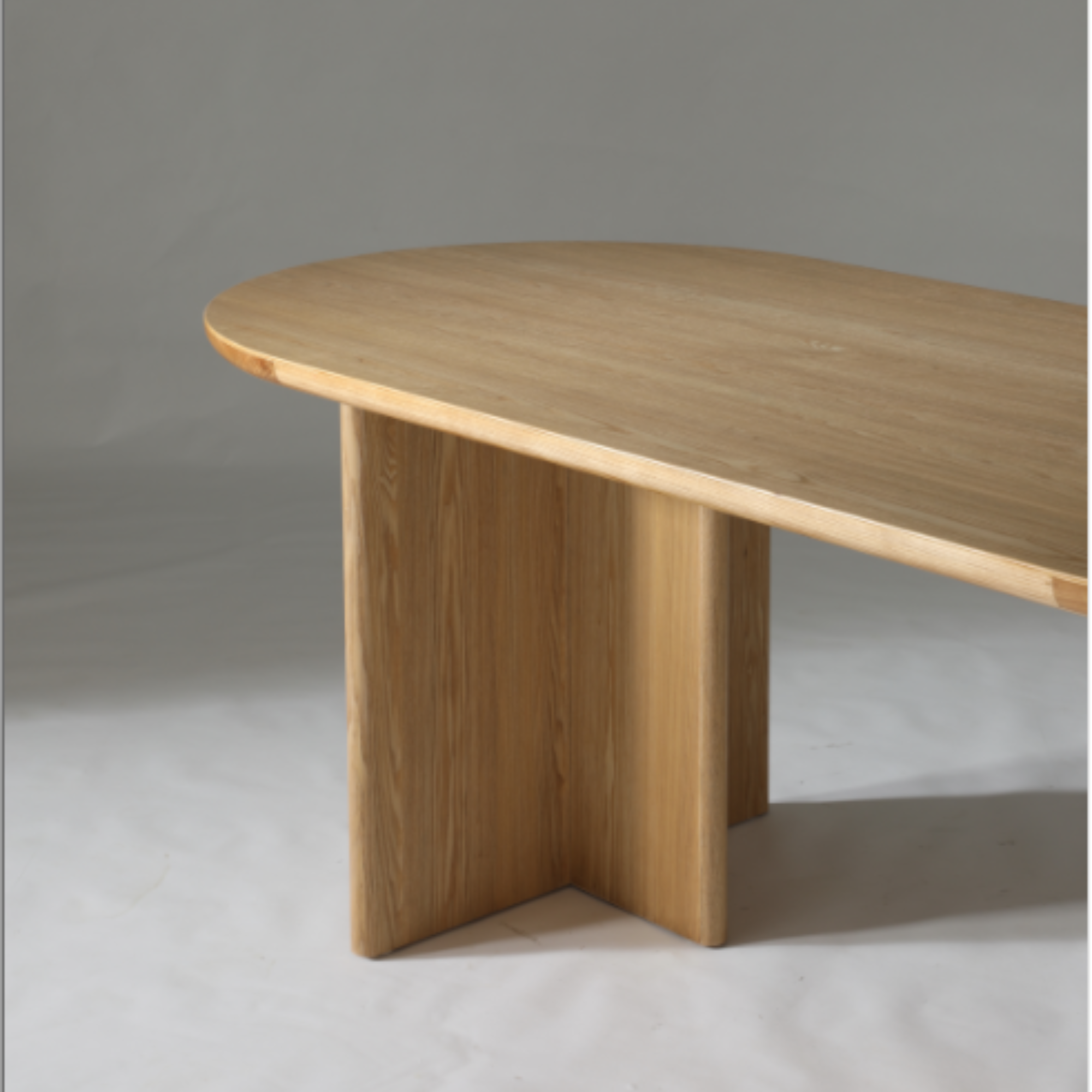 Natural Ash 1.6m dining table with sleek silhouette, ideal for entertaining guests in a stylish dining room.

