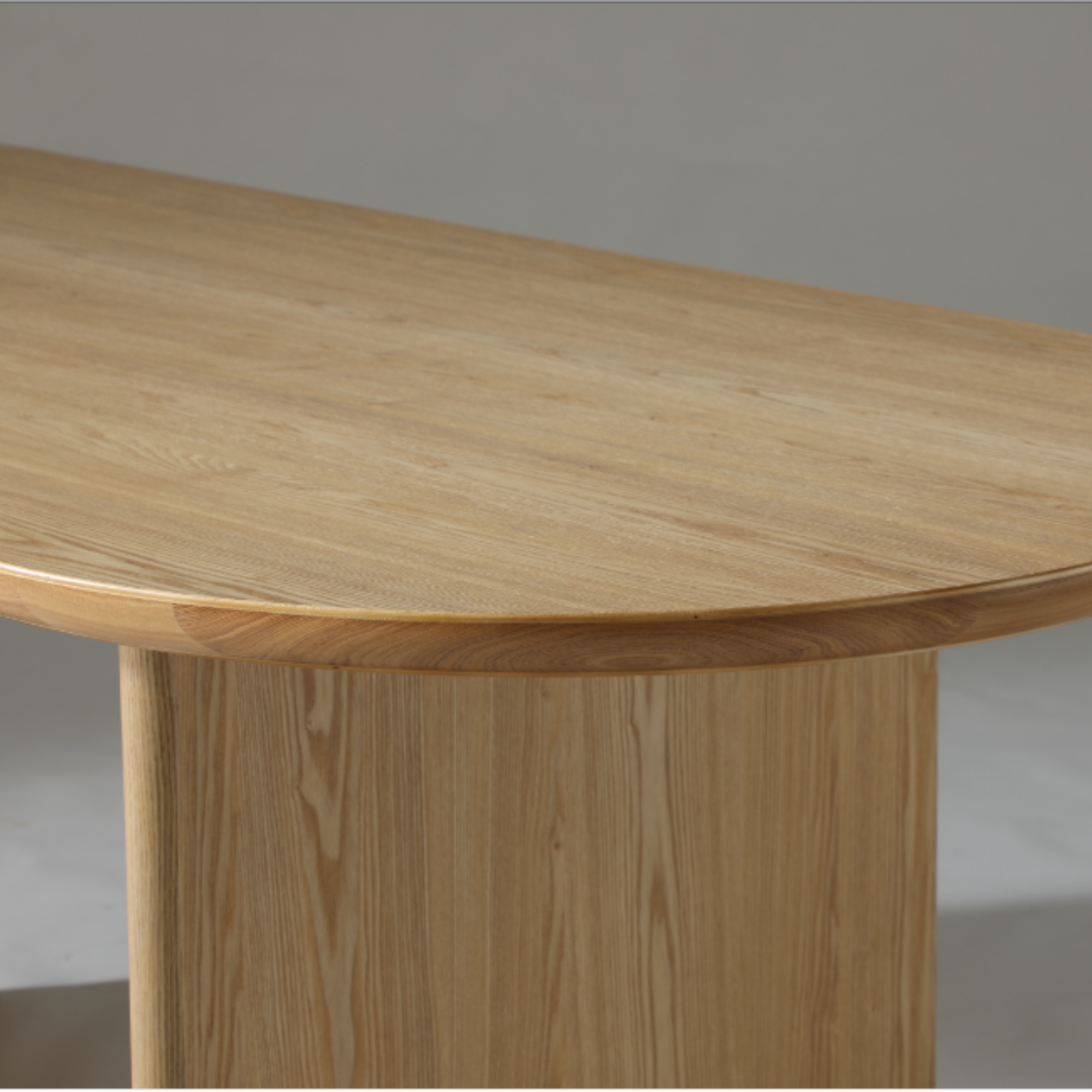 Premium 1.6m Natural Ash dining table with curved-edge design, perfect for elegant dining spaces and stylish interiors.

