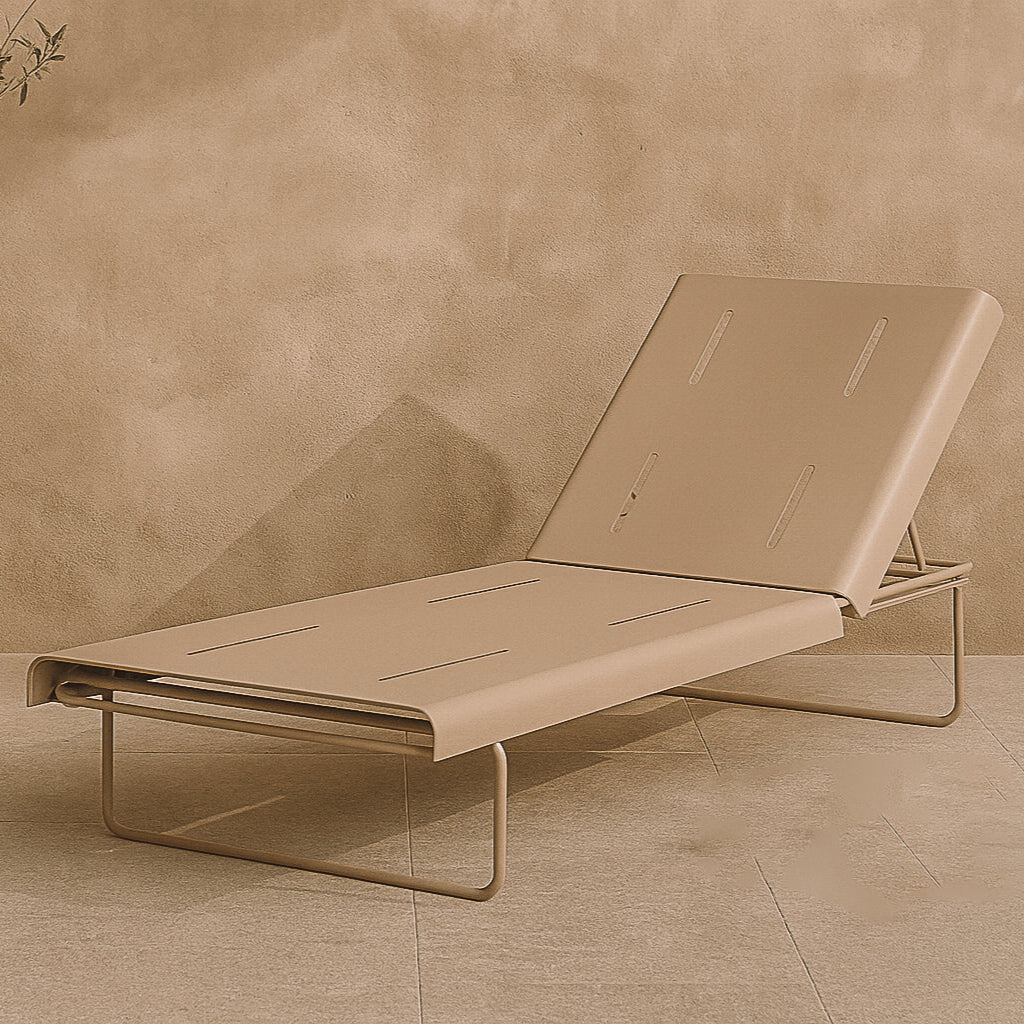 Sand finish Parco Outdoor Sun Bed on sunlit terrace, clean lines, comfortable reclined profile, easy-to-clean surface for everyday lounging.