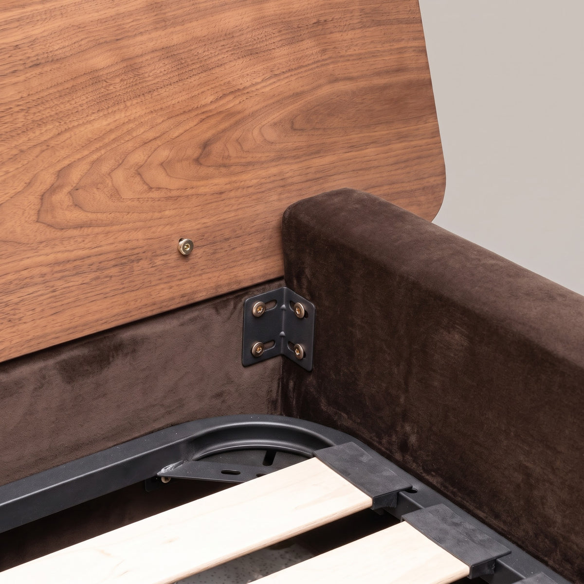 Frankie Queen Bed in Chocolate velvet, headboard bracket and walnut grain close-up