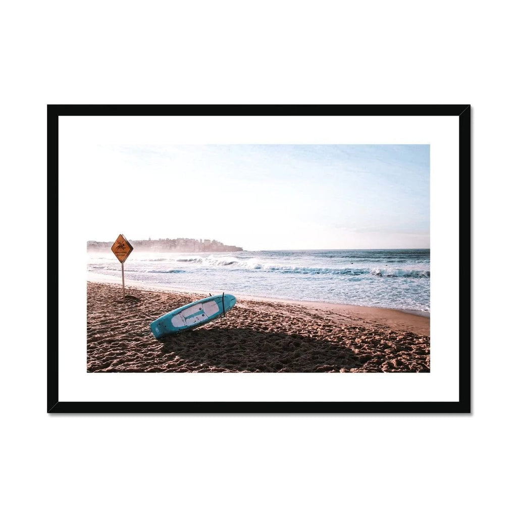 SeekandRamble Framed A4 Landscape / Black Frame Resting On Bondi Beach Framed & Mounted Print